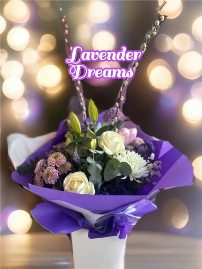 Lavender Dreams - A vision of delicate beauty, the bouquet is a harmonious blend of lilac, purple and pristine white. subtle purple hues and lending a touch of wildness alongside other carefully chosen seasonal flowers, creating a bouquet that feels both classic and freshly gathered. please note that some flowers may vary from picture shown due to the availibilty but the design will be the same