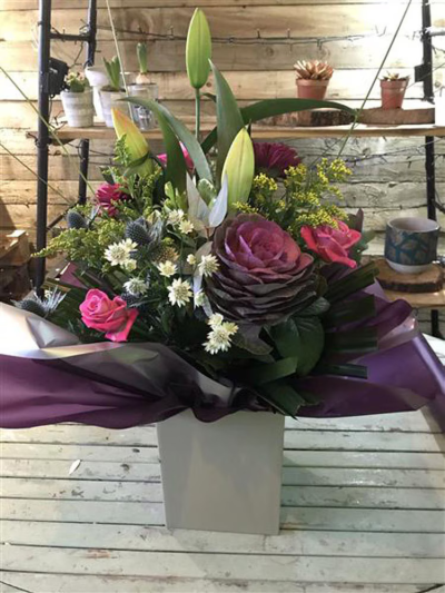 Vibrant Blossom - A selection of elegant vibrant flowers that will bring the light into any room.
Mixed seasonal flowers, including Roses, Lily, Gerbera, Brasica and scented Eucalyptus and much more. Flowers may vary at peak times, we will make a beautiful bouquet with substitute flowers at the same value.

Aqua Packed, this Bouquet is delivered in water.
Picture shows standard size option
Same day delivery available please order before 1pm